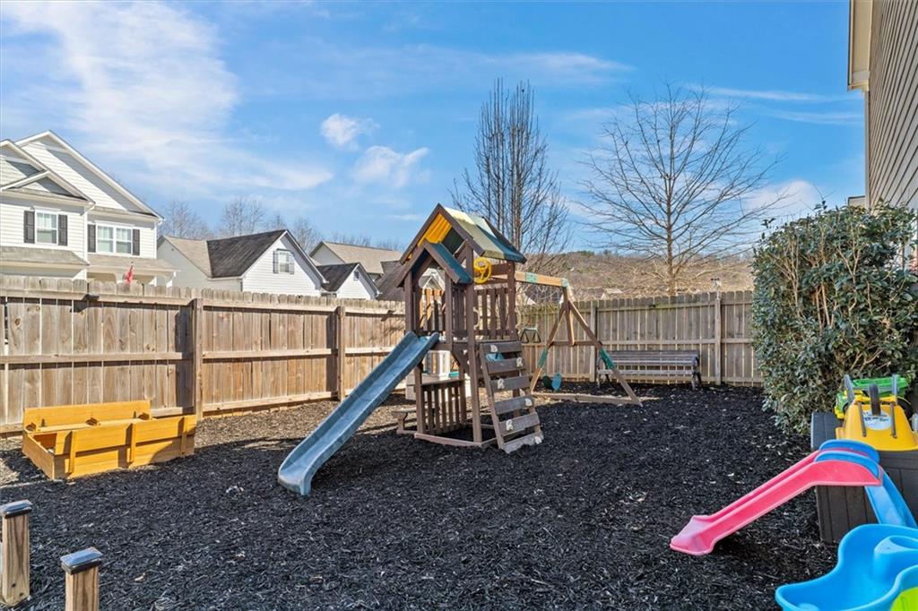 329 Rippling Drive Ball Ground, GA 30107 - Photo 35 of 43 a view of backyard of the house