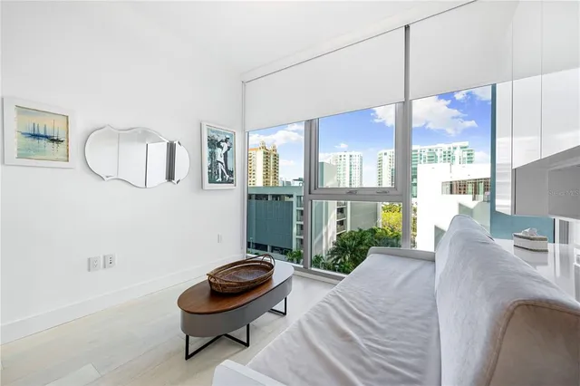 a backyard of a house with yard and outdoor seating