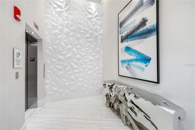 a kitchen with a table and chairs in it