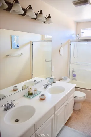 a bathroom with a sink and a toilet