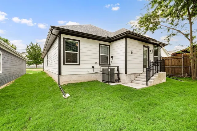 a picture of a bathroom with a shower