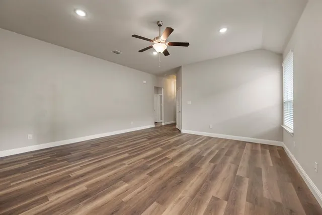 a kitchen with a sink stove and refrigerator