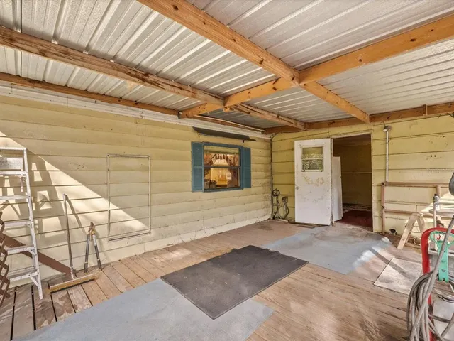a view of backyard with outdoor space
