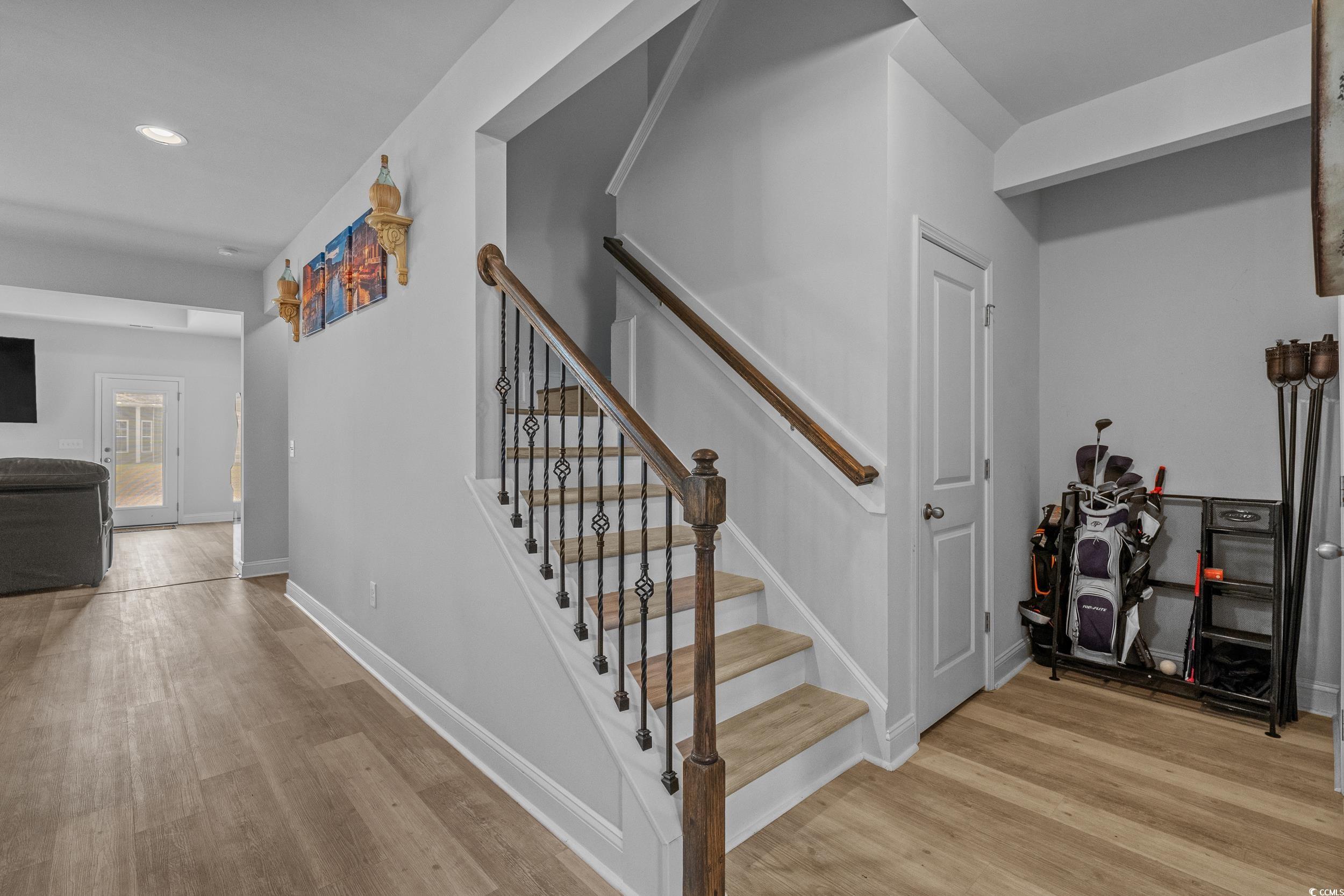 2064 Hazlette Loop Conway, SC 29526 - Photo 29 of 39 Staircase featuring baseboards, wood finished floors, and recessed lighting
