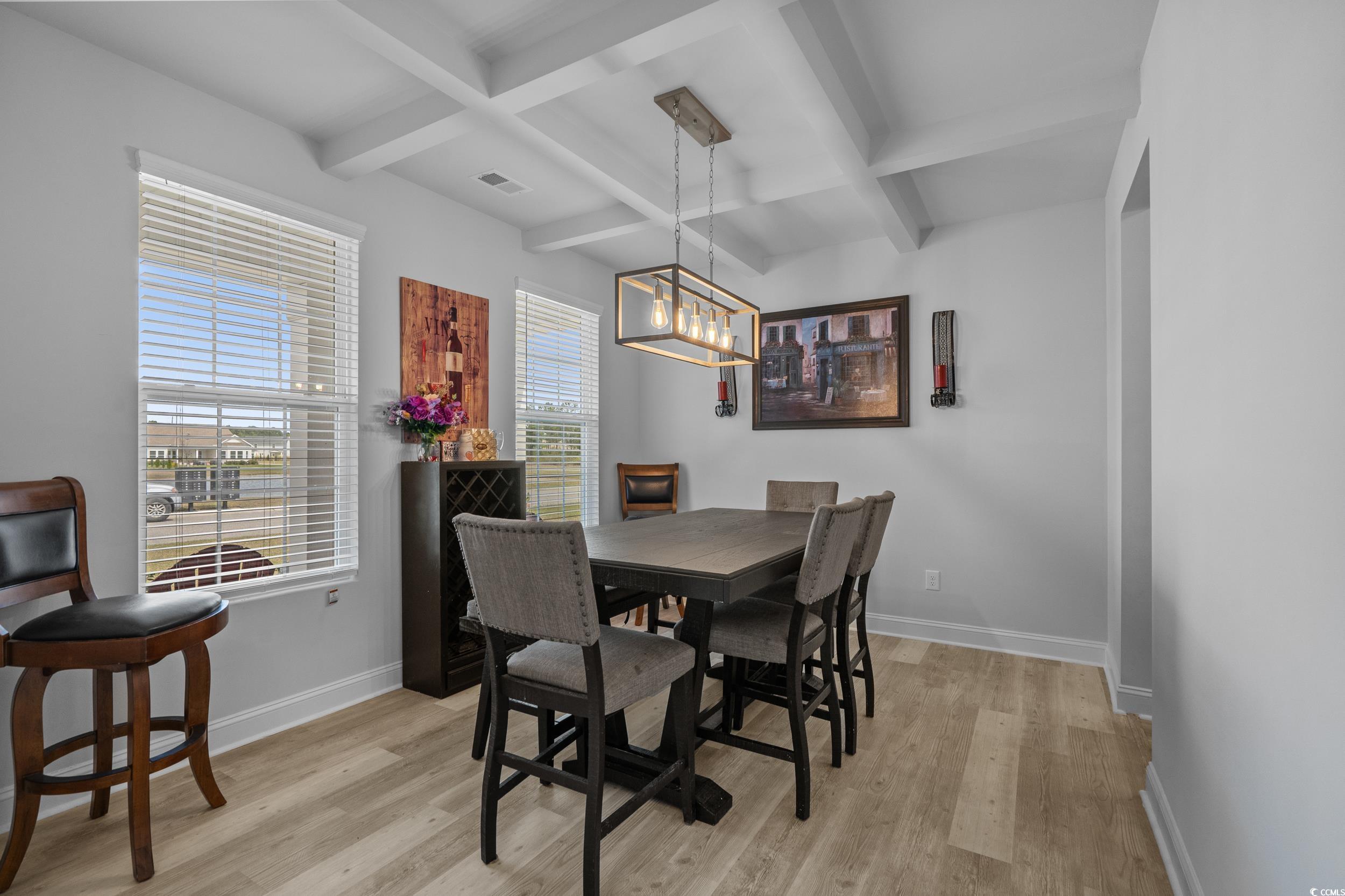 2064 Hazlette Loop Conway, SC 29526 - Photo 7 of 39 Dining area with coffered ceiling, baseboards, light wood finished floors, and visible vents