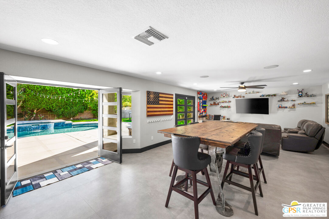 28220 Horizon Road Cathedral City, CA 92234 - Photo 3 of 40 a view of a dining room with furniture window and outside view
