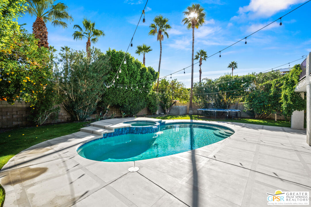 28220 Horizon Road Cathedral City, CA 92234 - Photo 38 of 40 a view of a swimming pool with a yard