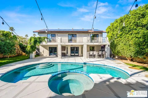 a view of a house with swimming pool