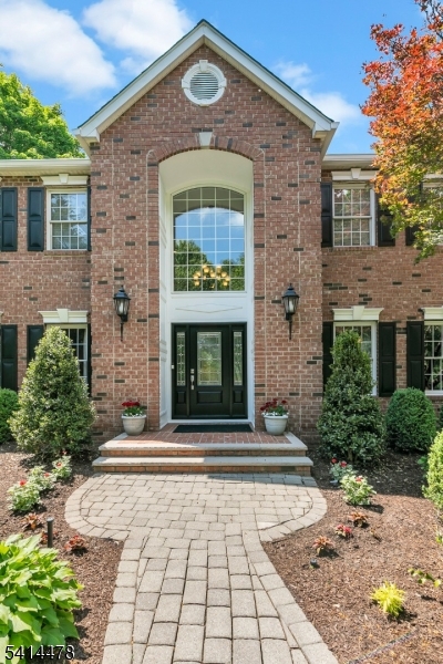 33 St Nickolas Way Bernards, NJ 07920 - Photo 4 of 50 a front view of a house with a yard