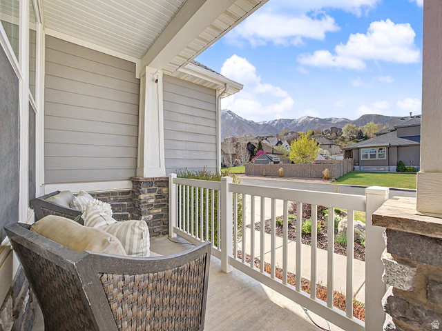 117 Ridge View Drive Elk Ridge, UT 84651 - Photo 35 of 42 Porch featuring a residential view and a mountain view