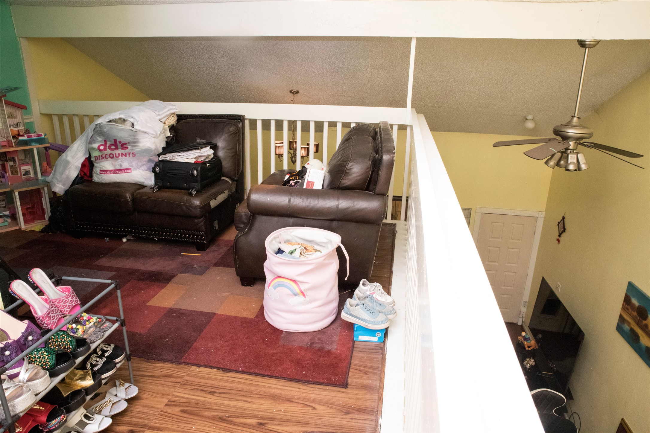 13005 Leader Street, Unit 563 Houston, TX 77072 - Photo 8 of 18 a living room with furniture and a wooden floor