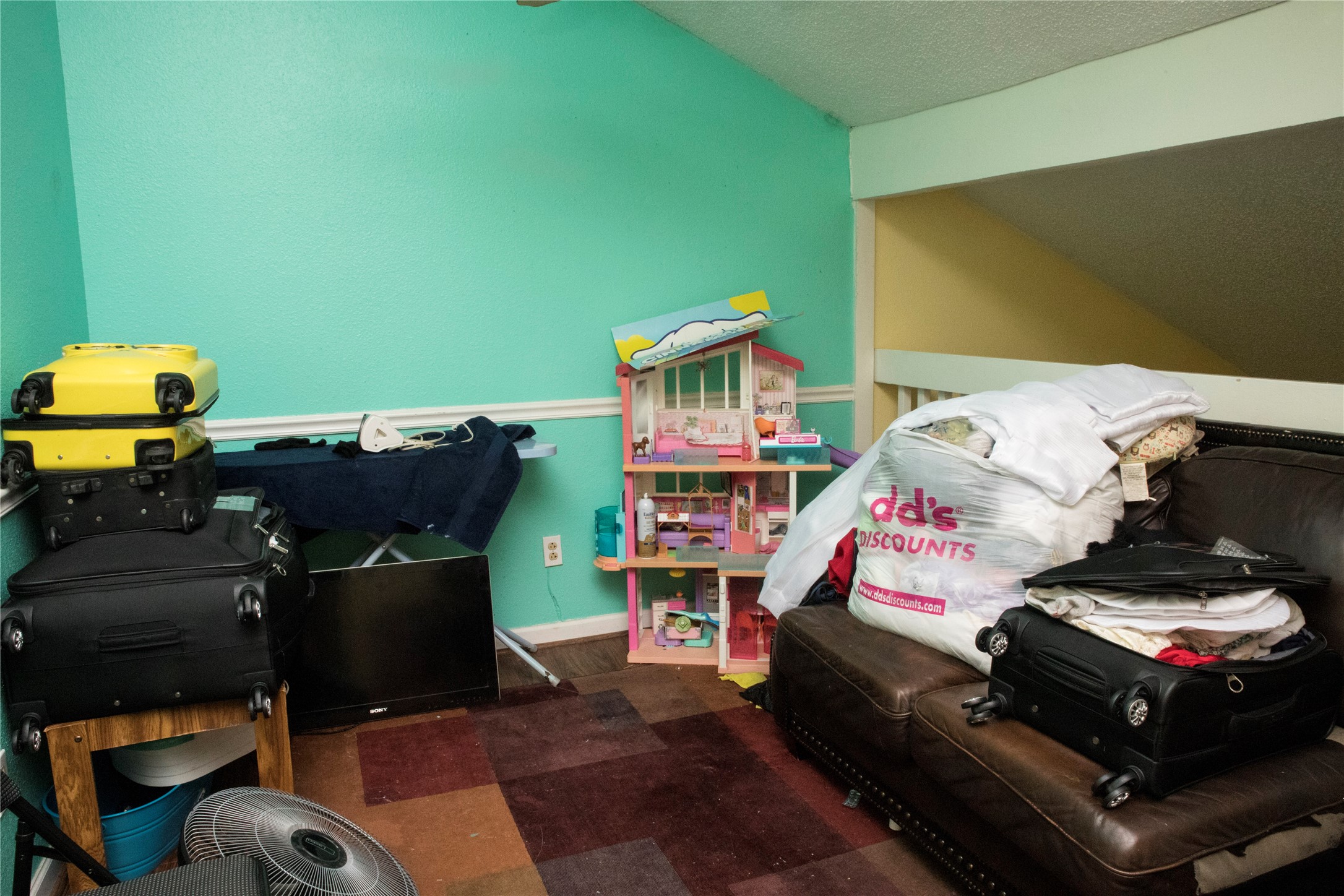 13005 Leader Street, Unit 563 Houston, TX 77072 - Photo 10 of 18 a bedroom with a bed and a chandelier
