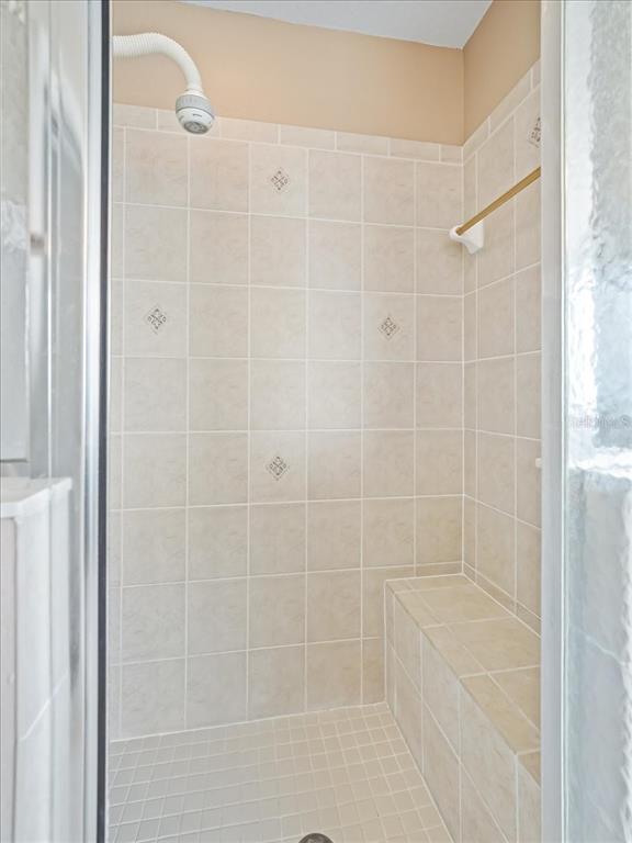 11025 Southeast 174th Loop Summerfield, FL 34491 - Photo 30 of 52 a bathroom with a shower