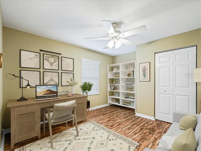 a bedroom with furniture and a window