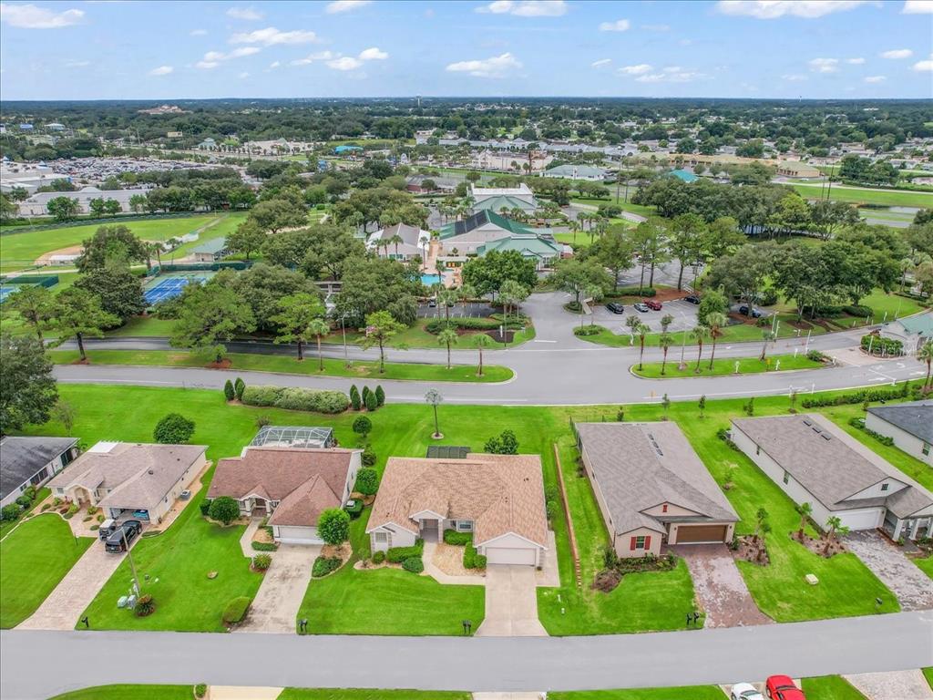 11025 Southeast 174th Loop Summerfield, FL 34491 - Photo 45 of 52 an aerial view of a houses with yard and green space