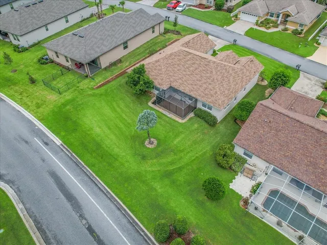 a bathroom with a glass shower door and a sink