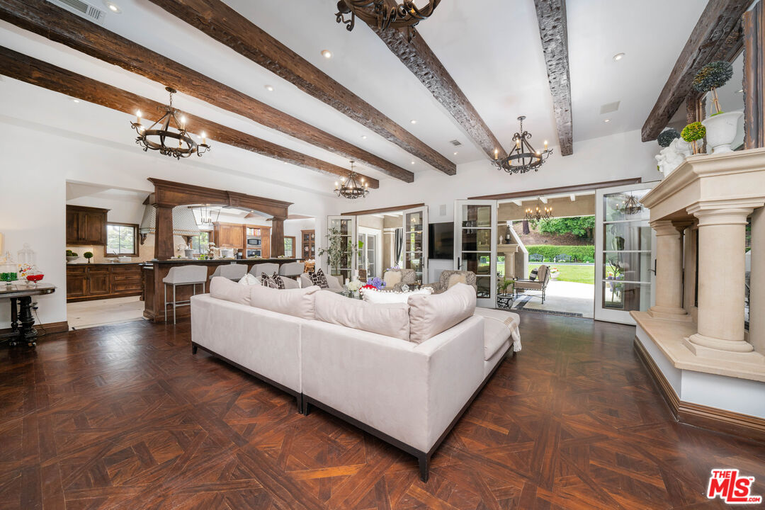 16632 Bienveneda Place Pacific Palisades, CA 90272 - Photo 5 of 62 a living room with furniture and a large window