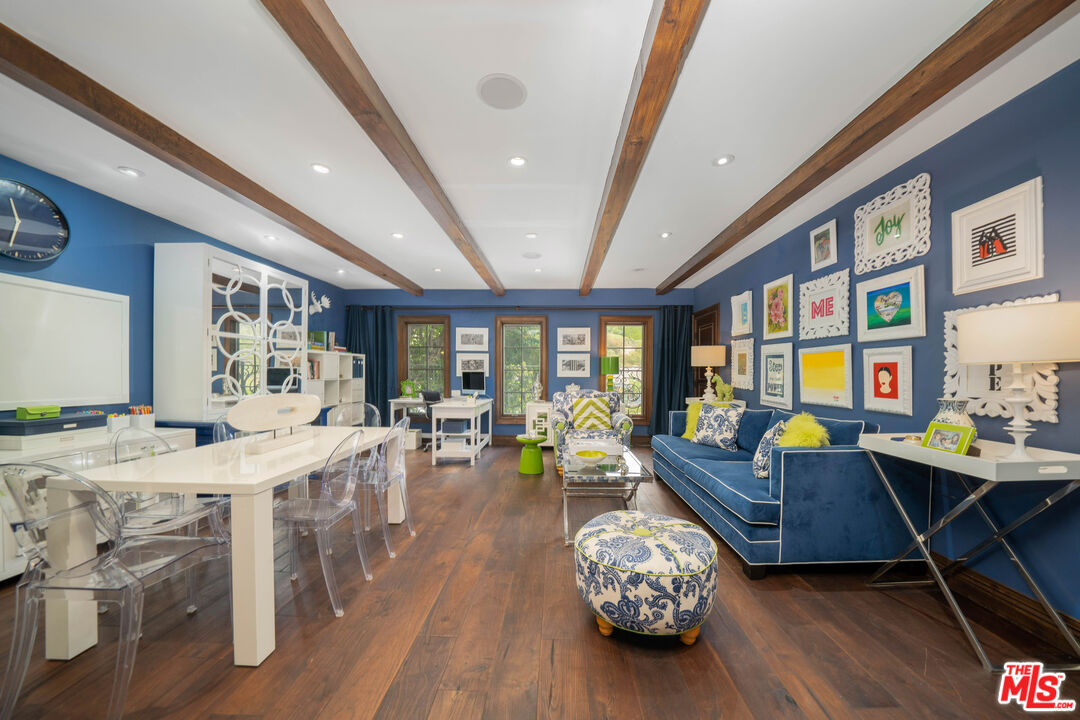 16632 Bienveneda Place Pacific Palisades, CA 90272 - Photo 8 of 62 a view of a dining room with furniture window and wooden floor