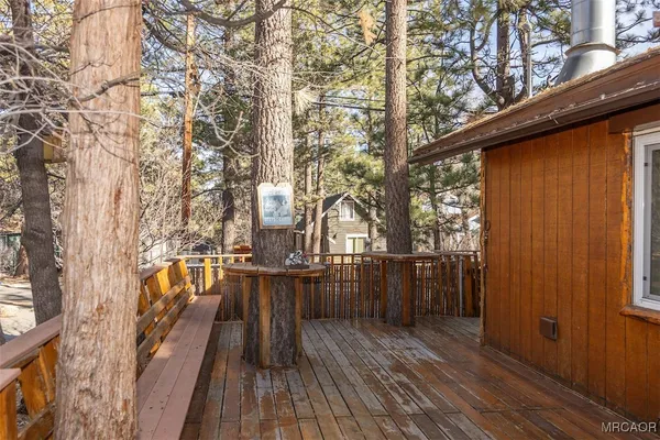 a view of balcony with wooden floor and outdoor space