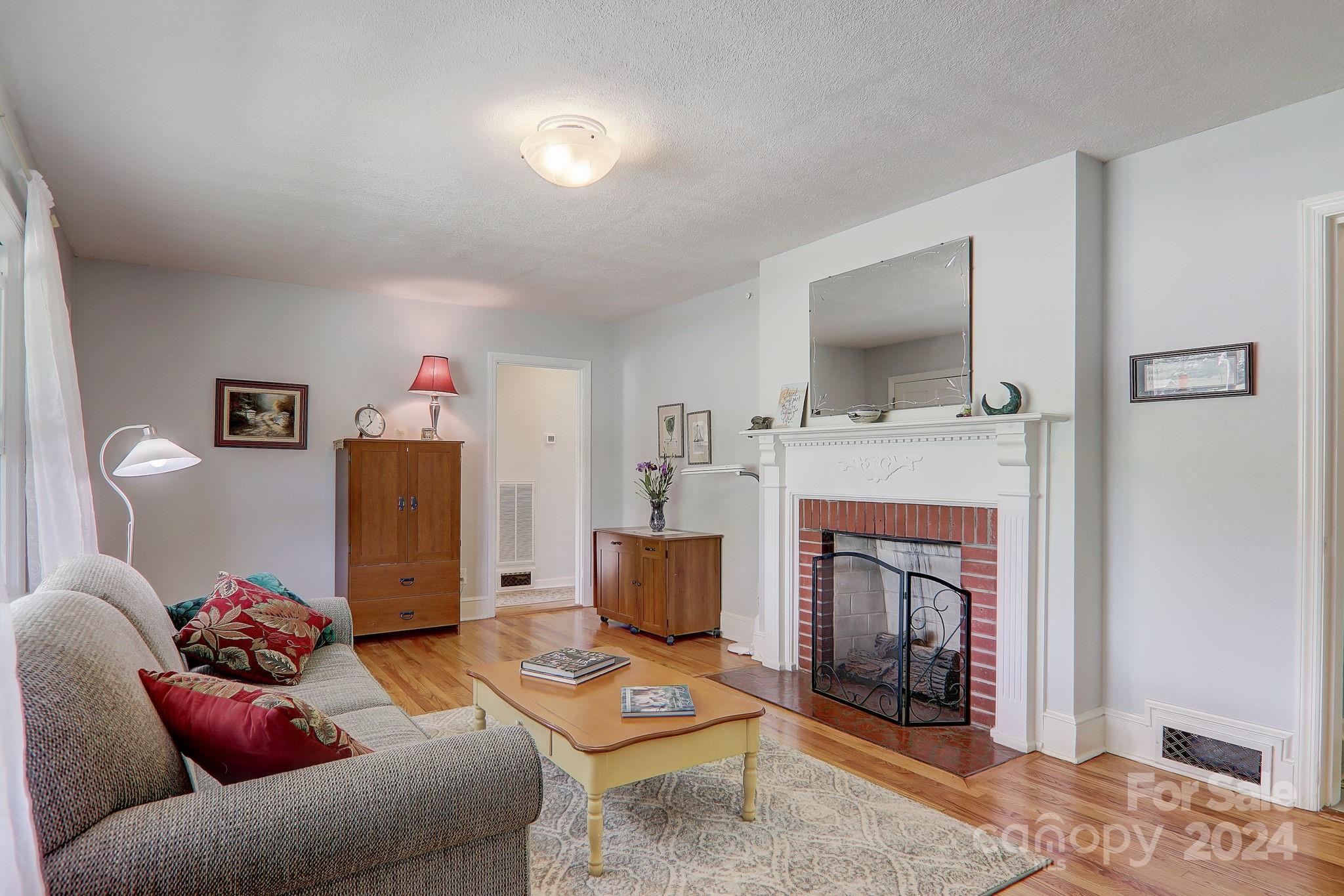 6093 Poors Ford Road Rutherfordton, NC 28139 - Photo 8 of 48 a living room with furniture and a fireplace