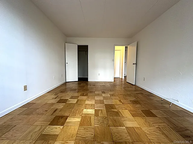 a view of a window in an empty room