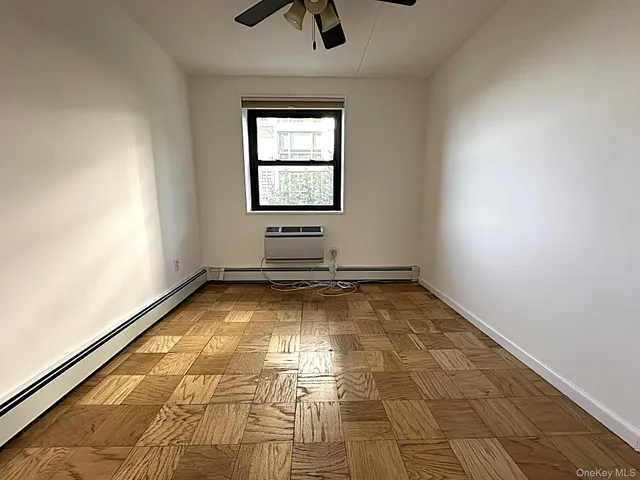 a view of a brick house with a large window