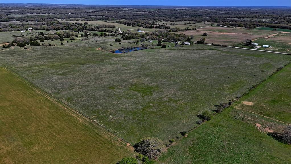 Tbd Well Service Road Bowie, TX 76230 - Photo 11 of 14 an aerial view of a houses with a yard