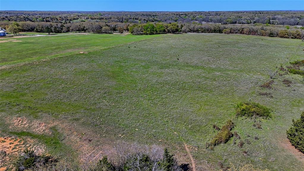 Tbd Well Service Road Bowie, TX 76230 - Photo 6 of 14 a view of an outdoor space and a yard