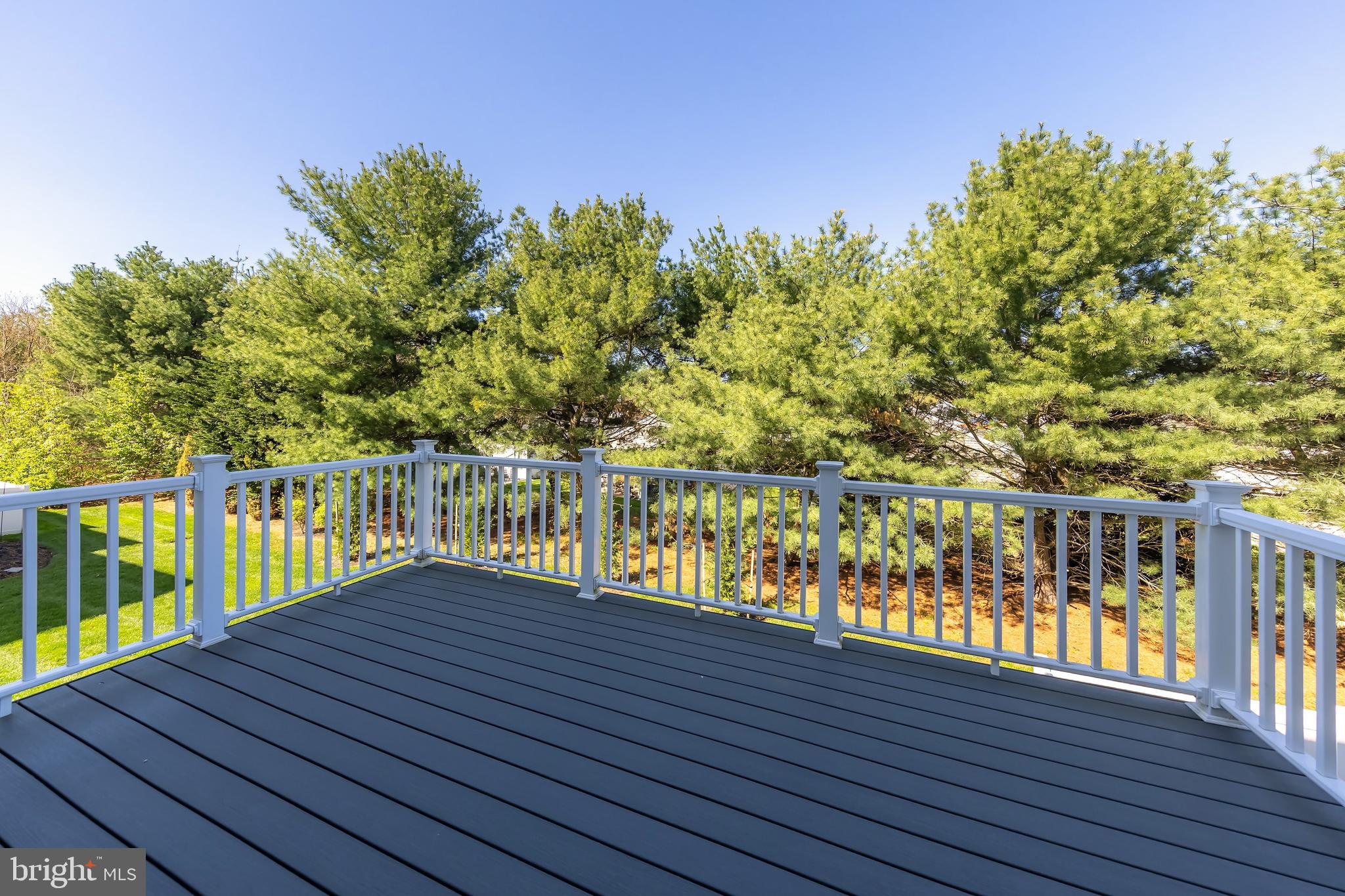 1036 Regency Place Sewell, NJ 08080 - Photo 13 of 18 a view of balcony with wooden floor and fence