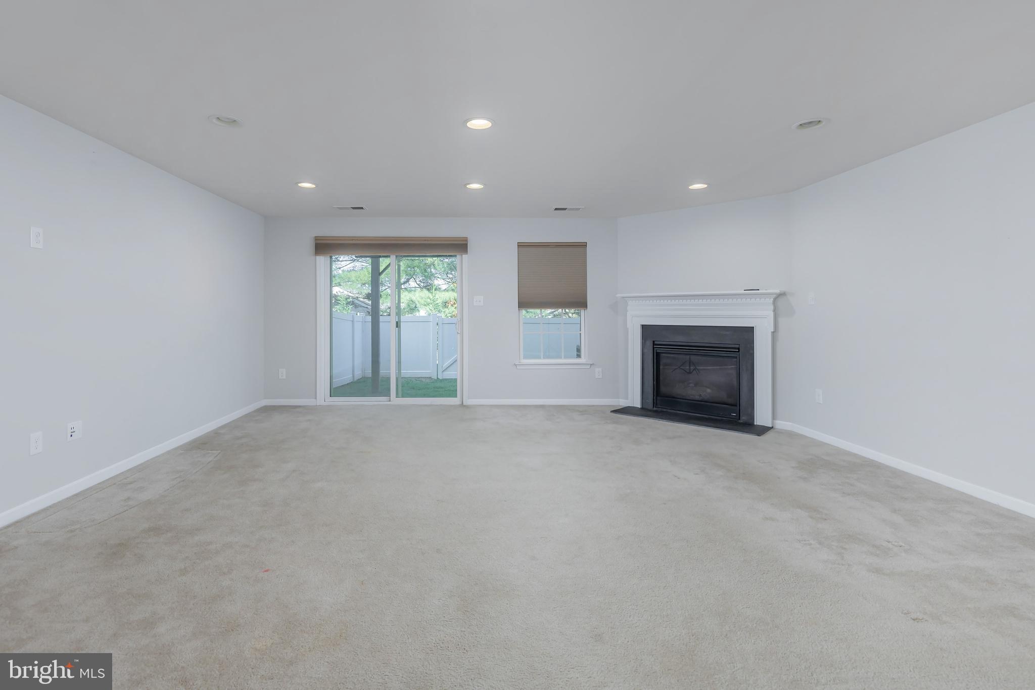 1036 Regency Place Sewell, NJ 08080 - Photo 3 of 18 a view of empty room with a fireplace