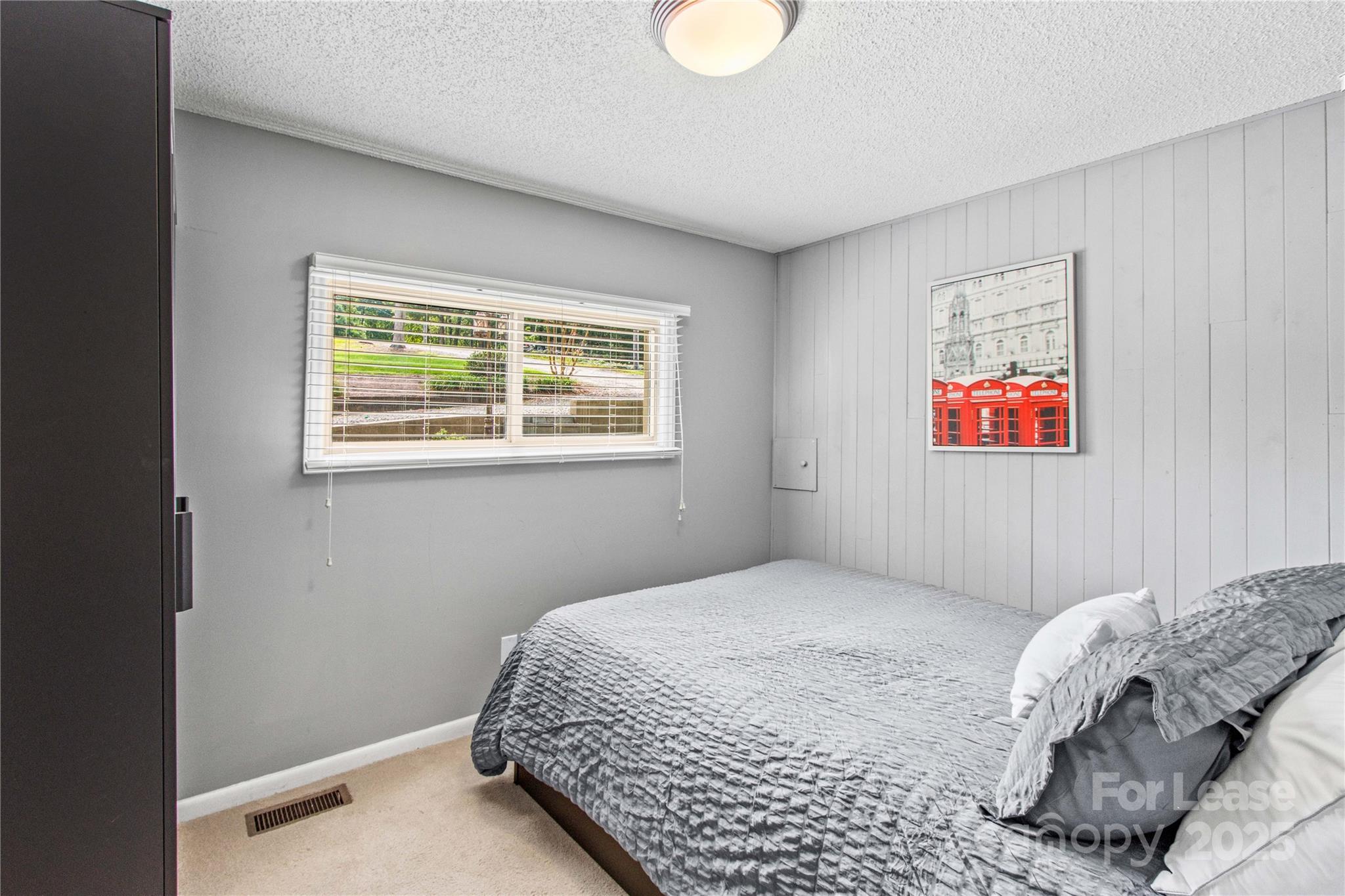 173 Waddell Road Mooresville, NC 28117 - Photo 24 of 47 a bedroom with a bed and a window