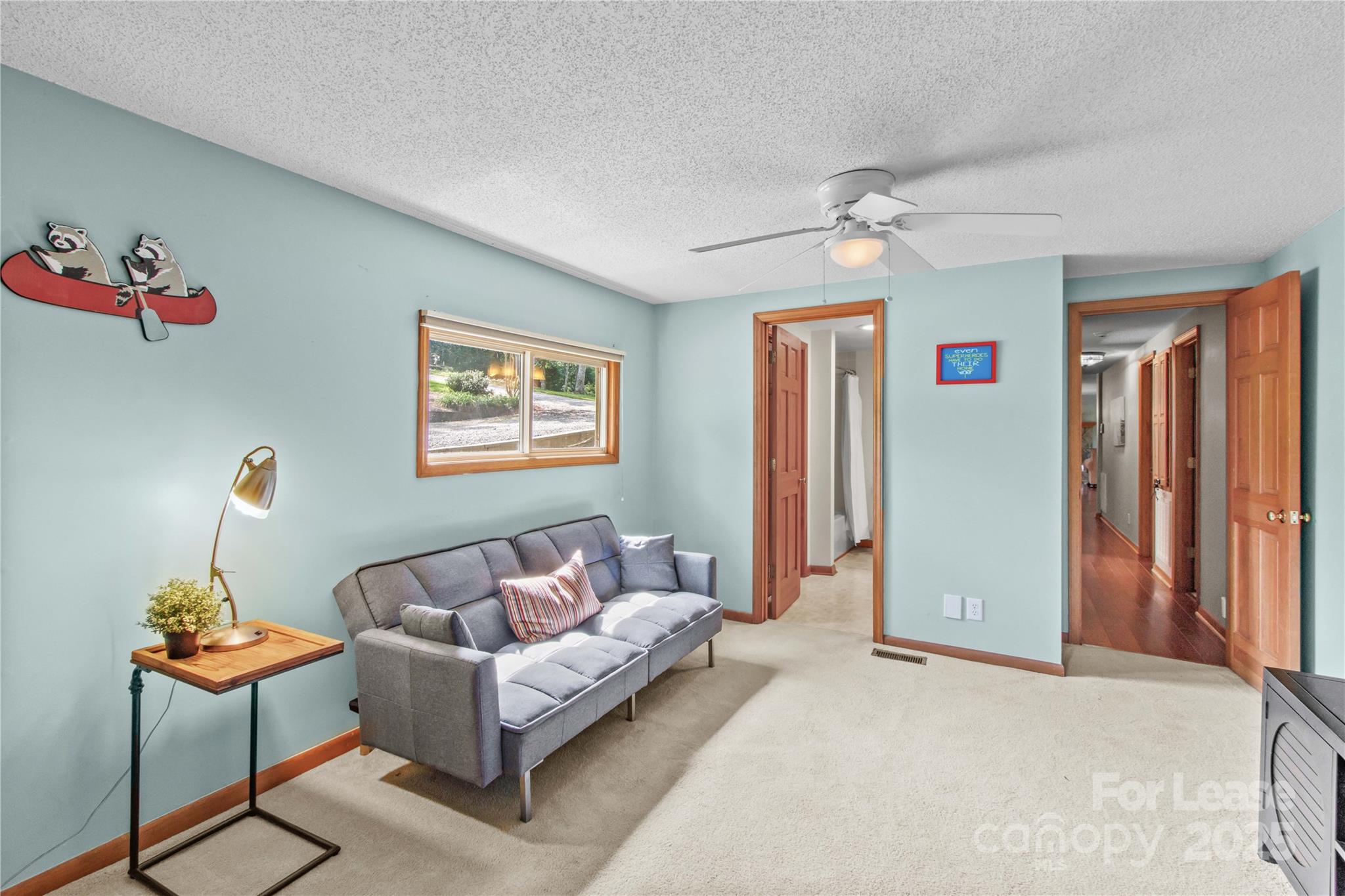 173 Waddell Road Mooresville, NC 28117 - Photo 32 of 47 a living room with furniture and a window