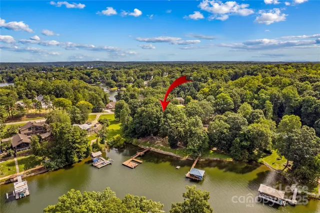 a view of a swimming pool with an outdoor space and seating area
