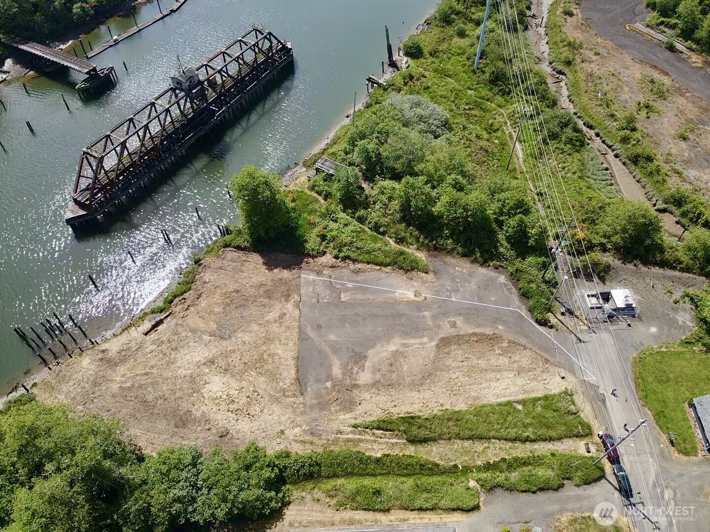 1010 Division Street Hoquiam, WA 98550 - Photo 16 of 40 a view of a backyard with plants