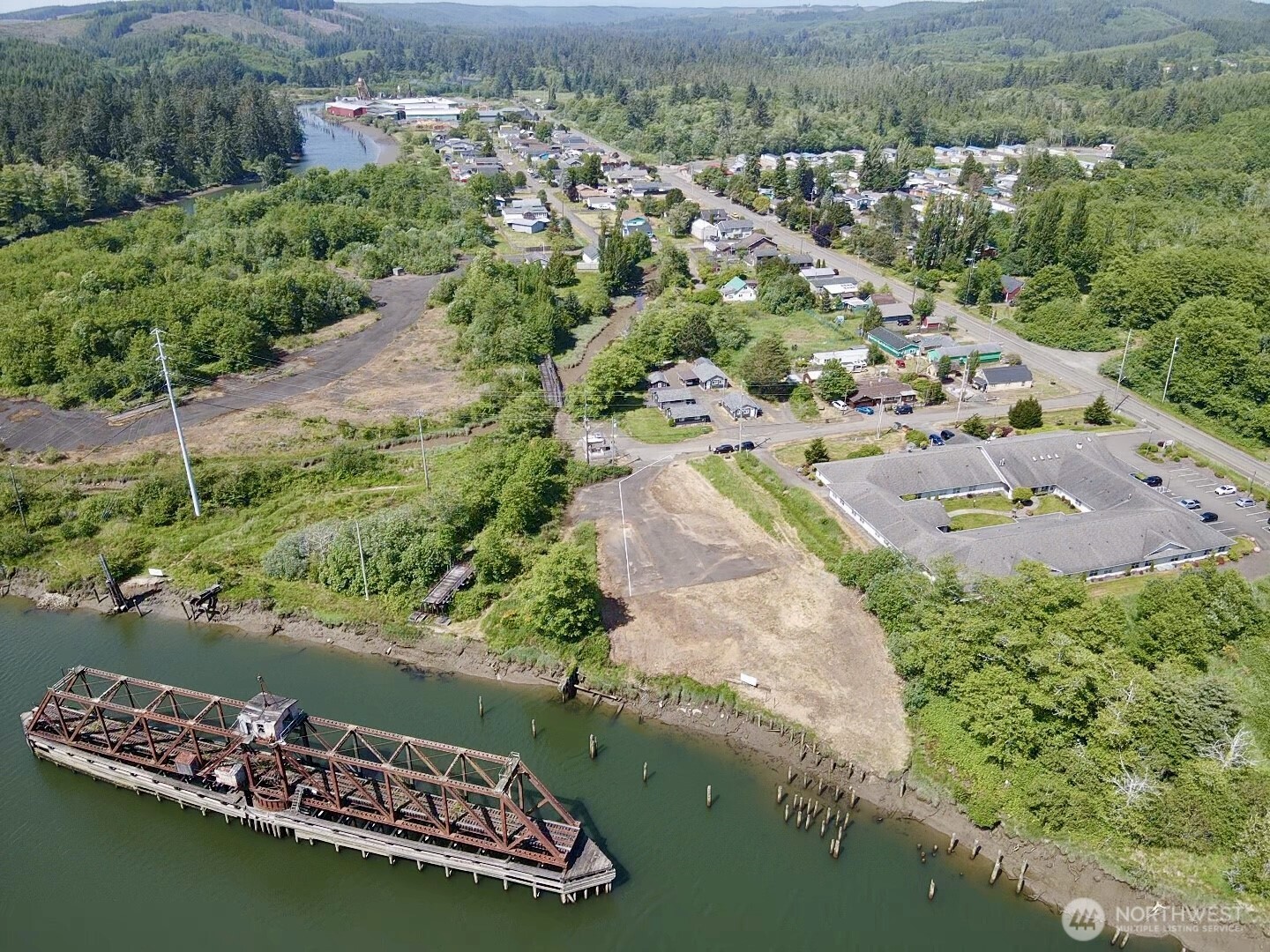 1010 Division Street Hoquiam, WA 98550 - Photo 18 of 40 an aerial view of a house with a lake view