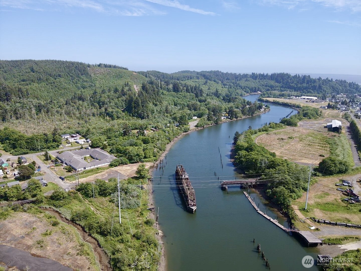 1010 Division Street Hoquiam, WA 98550 - Photo 23 of 40 an aerial view of lake residential house with outdoor space
