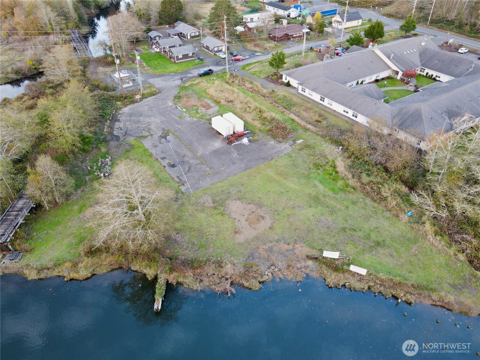 1010 Division Street Hoquiam, WA 98550 - Photo 31 of 40 an aerial view of residential houses with outdoor space