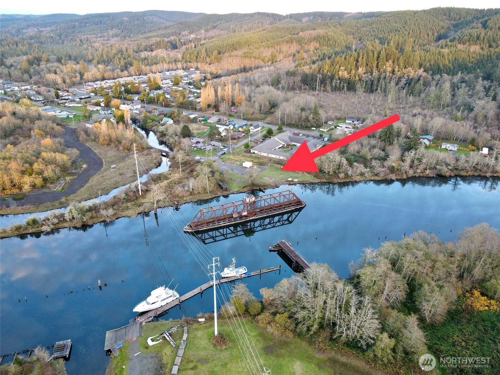 1010 Division Street Hoquiam, WA 98550 - Photo 4 of 40 an aerial view of residential houses with outdoor space