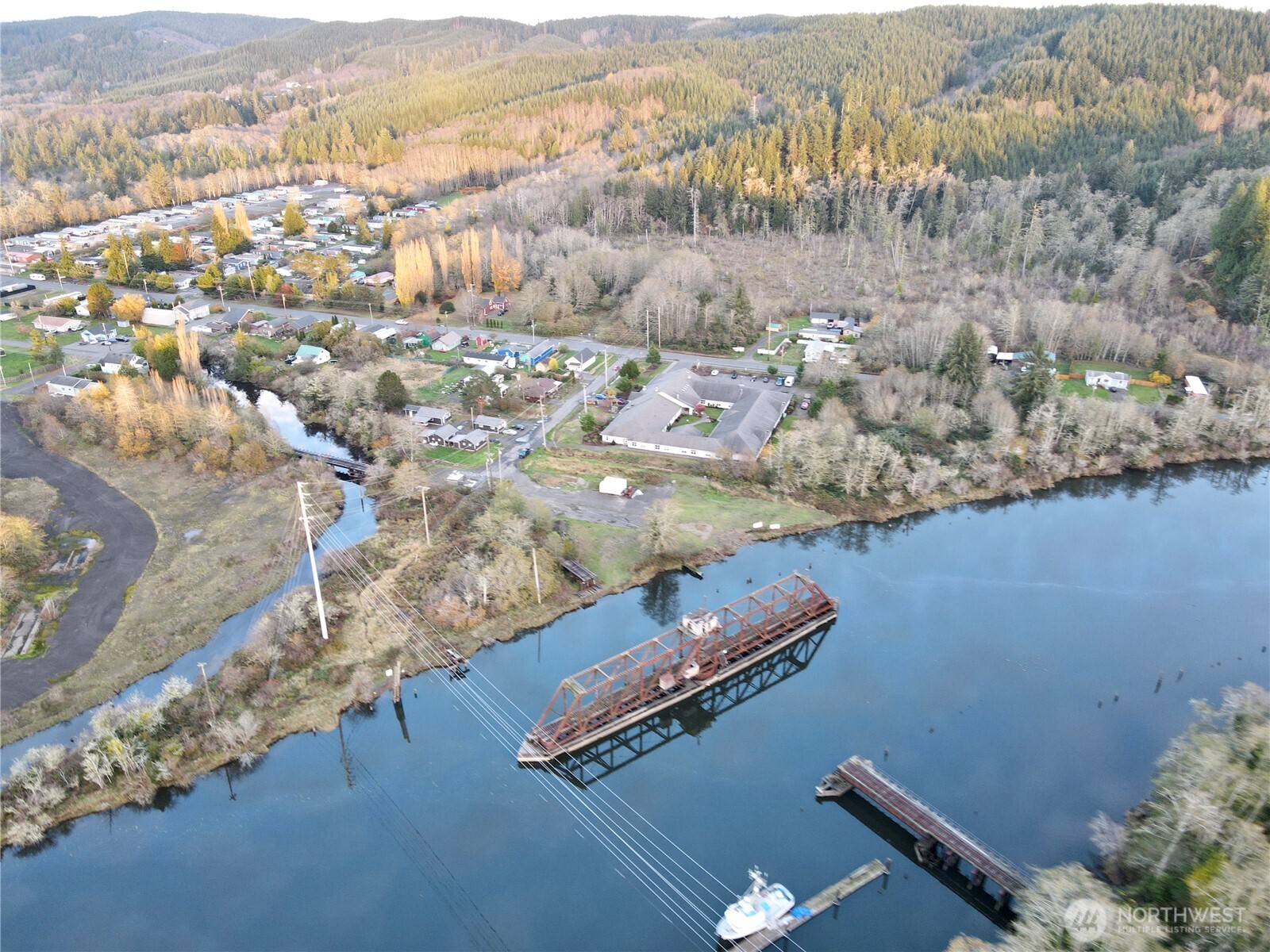 1010 Division Street Hoquiam, WA 98550 - Photo 7 of 40 an aerial view of residential houses with outdoor space