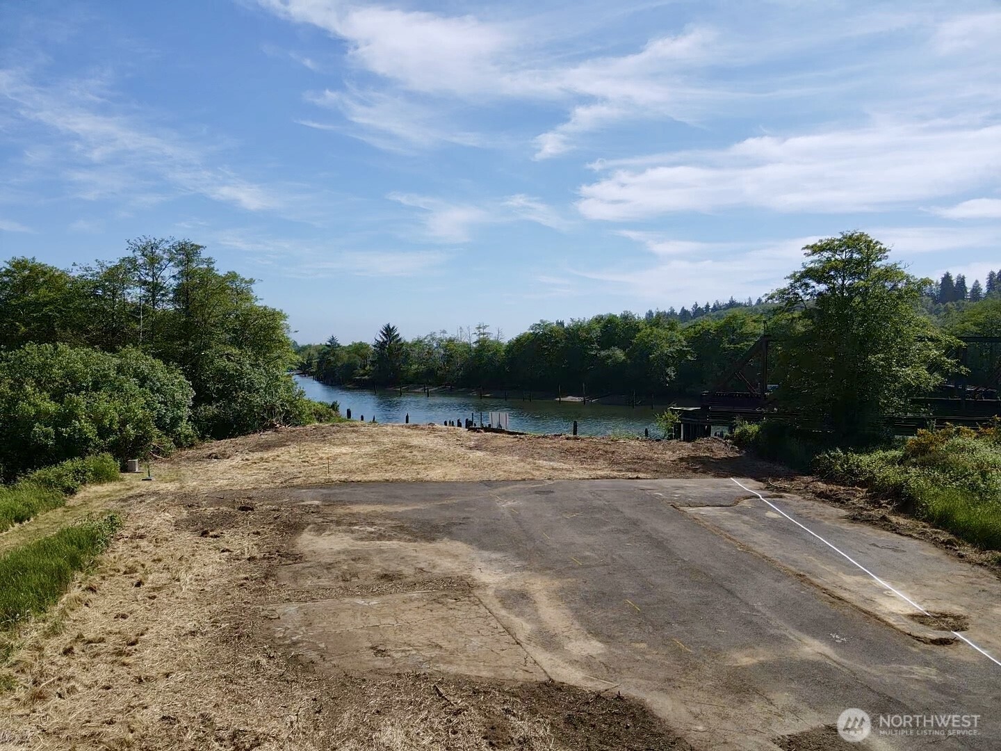 1010 Division Street Hoquiam, WA 98550 - Photo 9 of 40 a view of a lake with a big yard