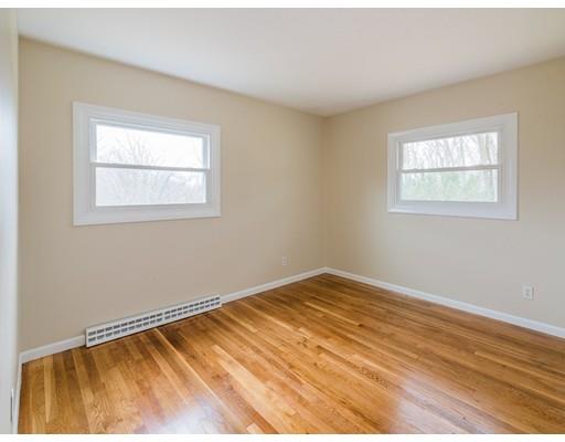 18 Pamela Road Framingham, MA 01701 - Photo 13 of 20 a view of an empty room with wooden floor and a window