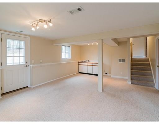 18 Pamela Road Framingham, MA 01701 - Photo 15 of 20 an empty room with windows and pillars in it