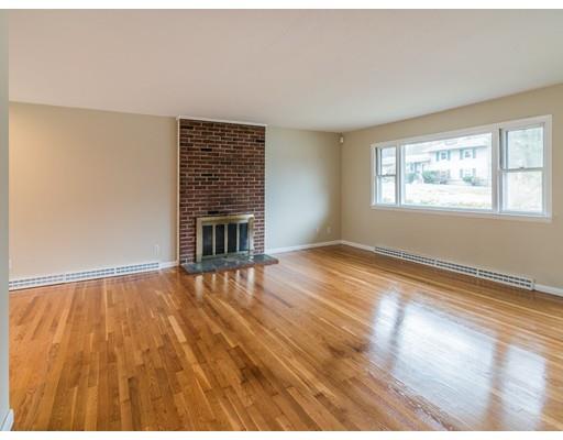 18 Pamela Road Framingham, MA 01701 - Photo 6 of 20 a view of an empty room with wooden floor and a window