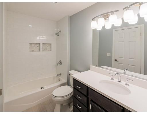 18 Pamela Road Framingham, MA 01701 - Photo 9 of 20 a bathroom with a sink a toilet and shower