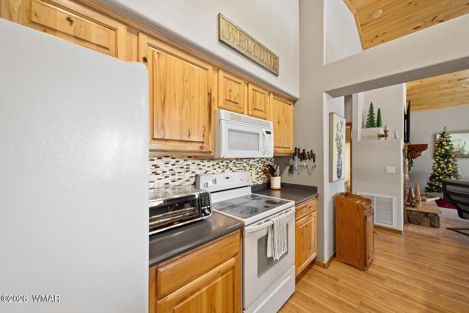 1041 South Pinon Circle Show Low, AZ 85901 - Photo 12 of 29 a kitchen with stainless steel appliances a stove and a refrigerator