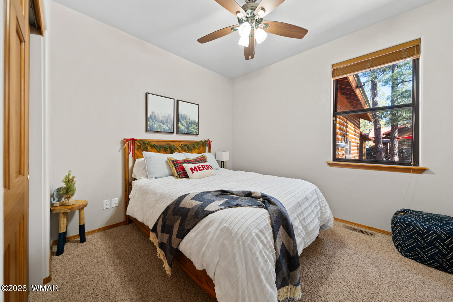 1041 South Pinon Circle Show Low, AZ 85901 - Photo 21 of 29 a bedroom with bed and a window