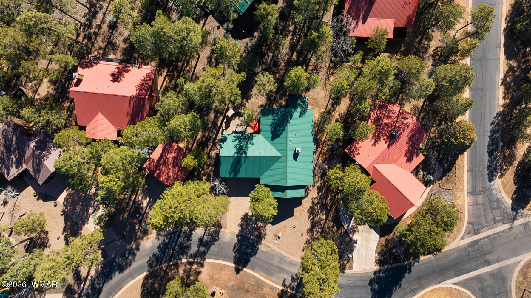 1041 South Pinon Circle Show Low, AZ 85901 - Photo 28 of 29 an aerial view of a house with a yard and garden