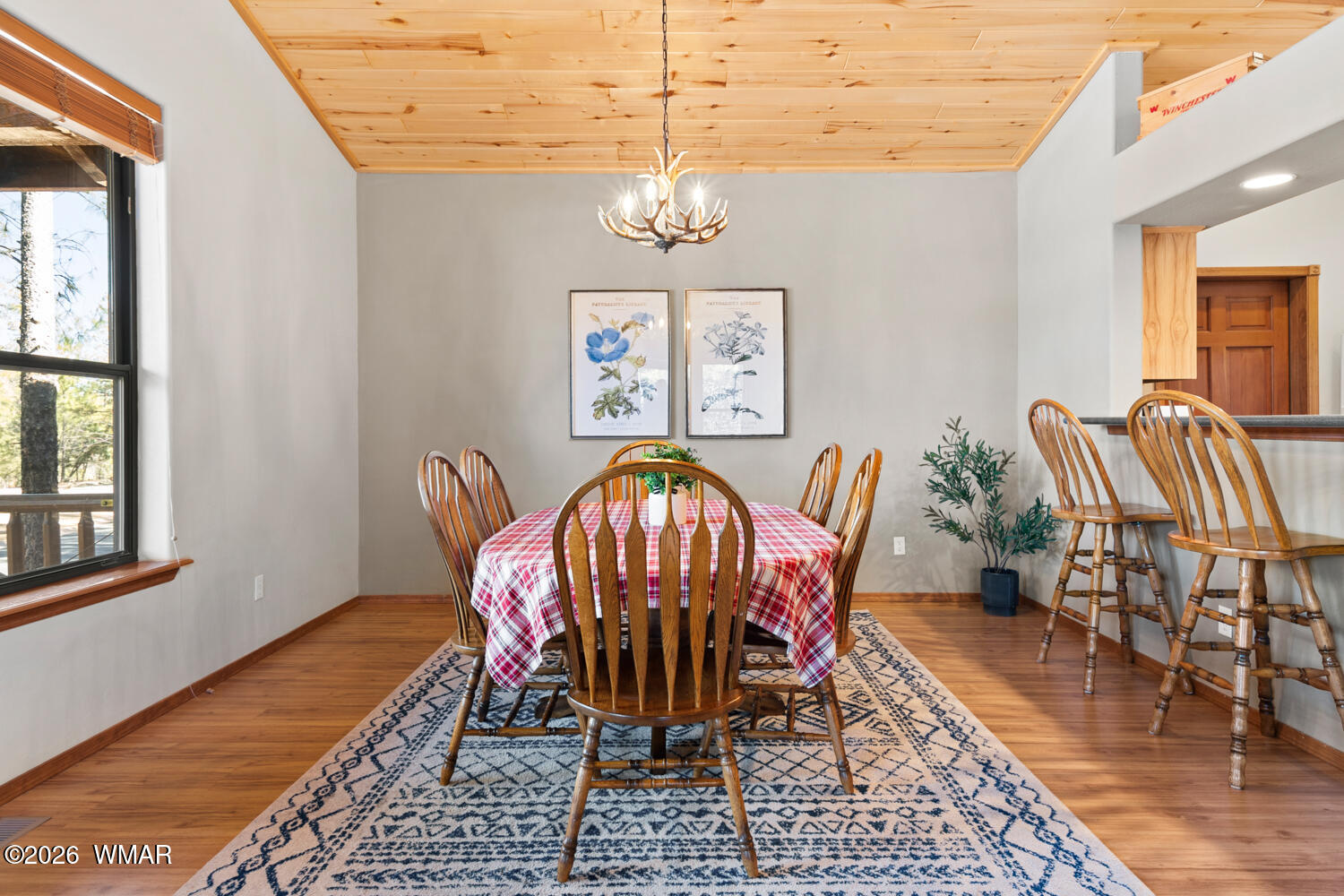 1041 South Pinon Circle Show Low, AZ 85901 - Photo 8 of 29 a view of a dining room with furniture window and wooden floor