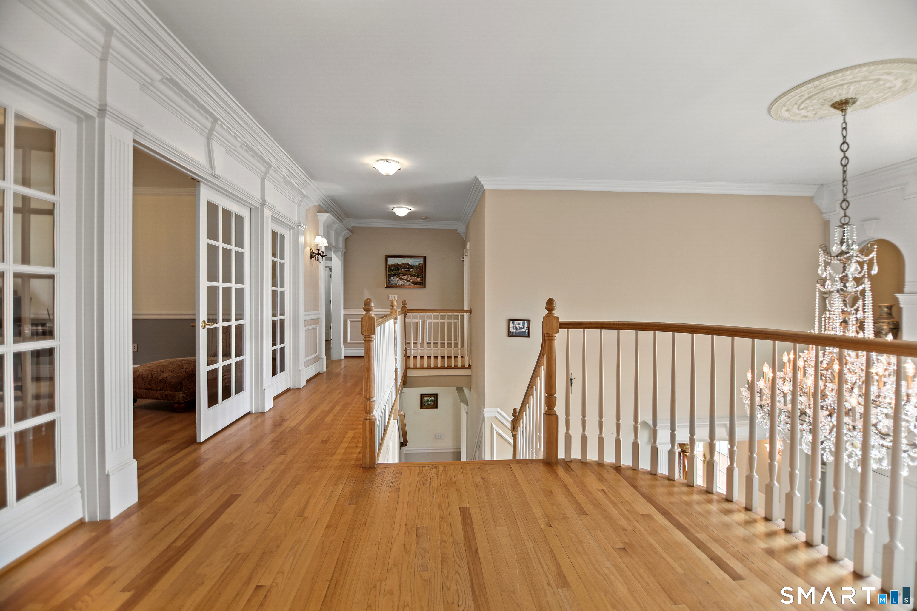83 Bayberry Hill Road Avon, CT 06001 - Photo 20 of 34 a view of livingroom with furniture and wooden floor