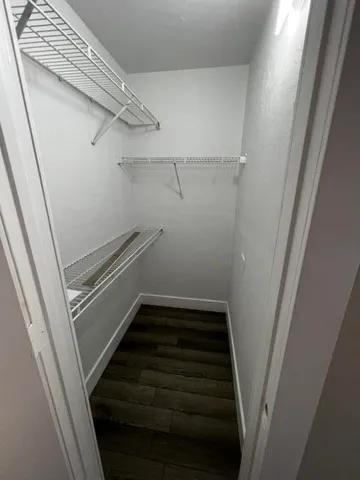 a bathroom with a toilet and a sink